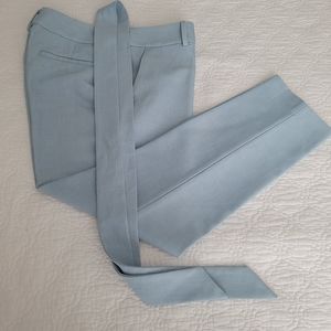 Light blue pants with waste tie.